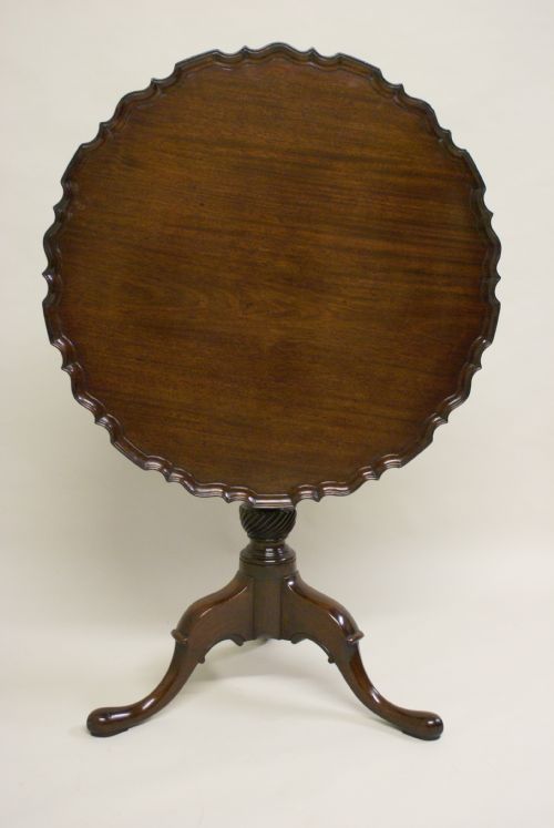 A Fine George III Mahogang Piecrust Tripod Table.