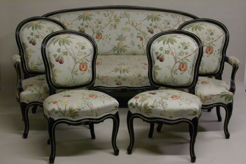 A 19th Century Ebonised Salon Suite in the French Hepplewhite Style.