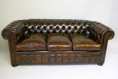 A 1920'S 3 Seater Leather Chesterfield.