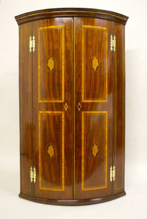 A Very Attractive George IV Mahogany Bow-fronted Corner Cupboard