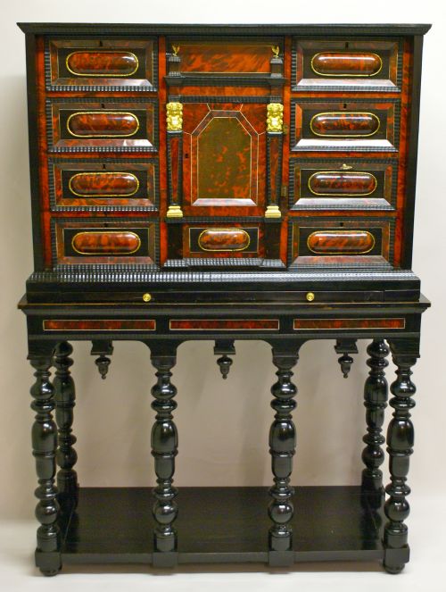 A Late 17th Century Flemish Tortoise Shell and Ebony Cabinet on Stand.