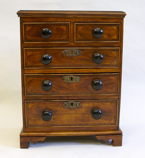 An Early 19th Century Fruitwood Miniature Chest of Drawers