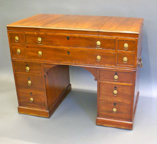A Rare Metamorphic Campaign Military Knee-hole Desk.