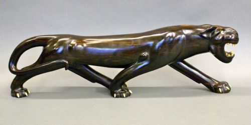 A Large Calamander Wood Sculpture of a Panther