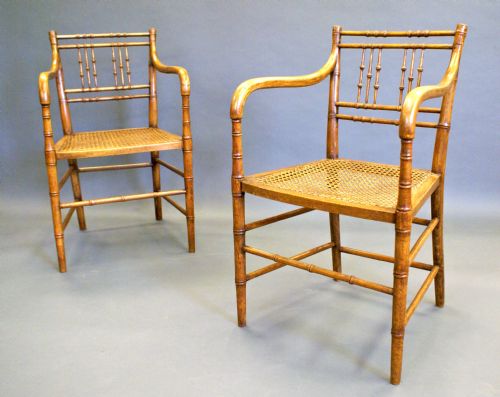 A Pair of Regency Faux Bamboo Arm Chairs
