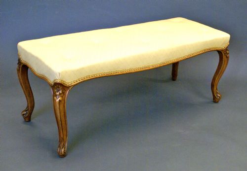 A Mid Victorian Walnut Long Stool