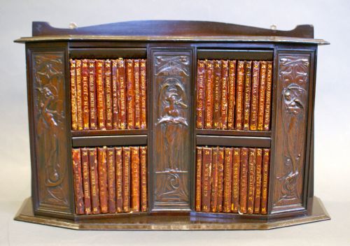 A Small, Art Nouveau Wall Hung Bookcase Containing the Works of William Shakespeare