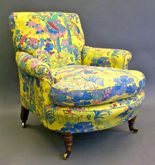 An Original Howard and Sons Arm Chair