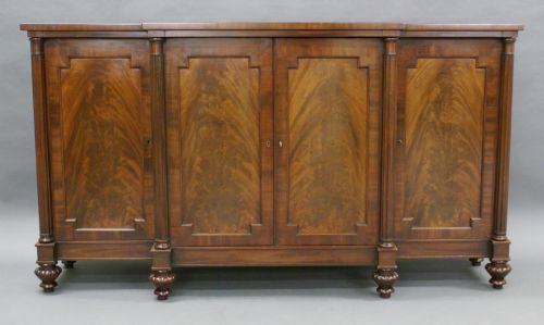 A Regency Period Mahogany Breakfront Cabinet.