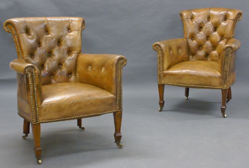 A Small Pair of Edwardian Library Arm Chairs