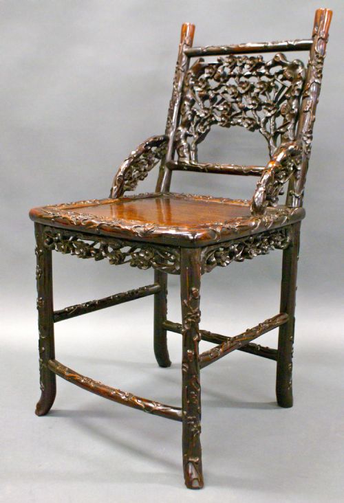 A Beautifully Carved Chinese Hardwood Arm Chair