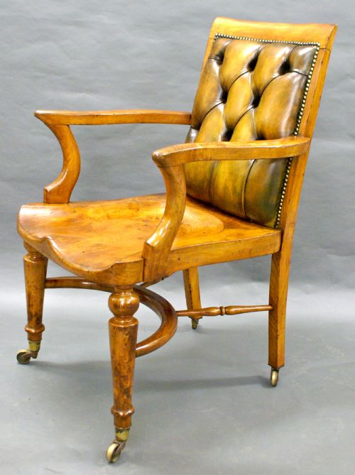 A Large Chestnut Desk/captains Arm Chair