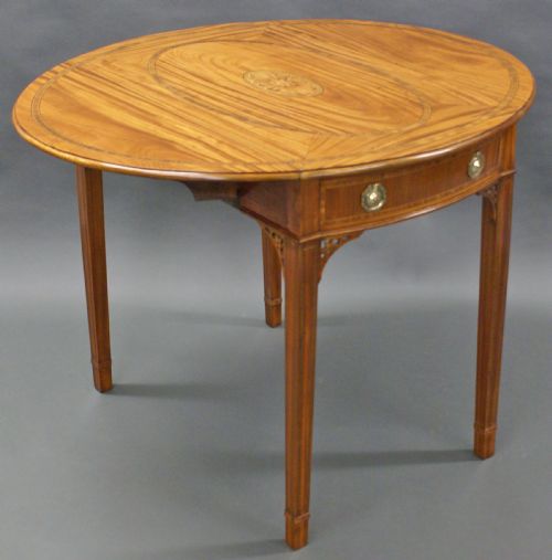 A 19th Century Oval Satinwood Pembroke Table