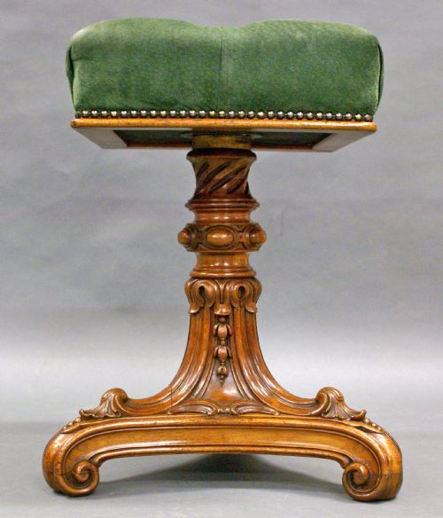 A Beautifully Carved Walnut Victorian Music Stool
