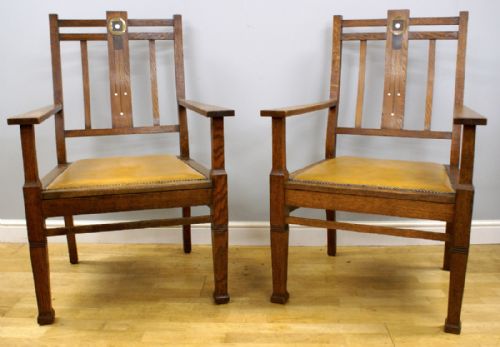 An Impressive Pair of Arts & Crafts Oak Arm Chairs