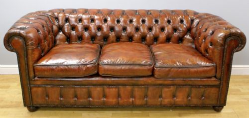 A Buttoned and Brass Nailed, Leather Chesterfield