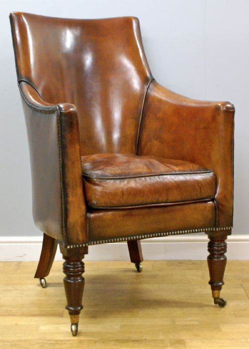 A George III Mahogany Library Arm Chair