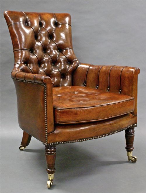 A William IV Rosewood, Leather Upholstered Arm Chair.