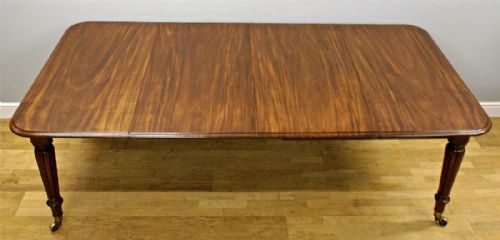 A Fine Quality Cuban Mahogany Extending Dining Table