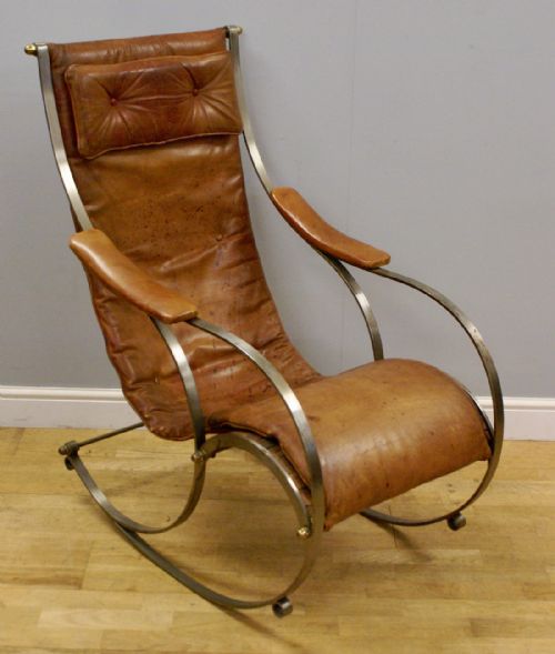 A Steel and Leather Rocking Chair by R.w.winfield.