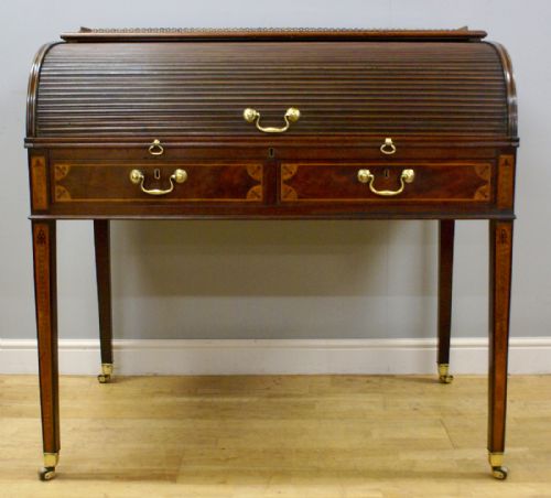 A George III Mahogany Cylinder Desk.