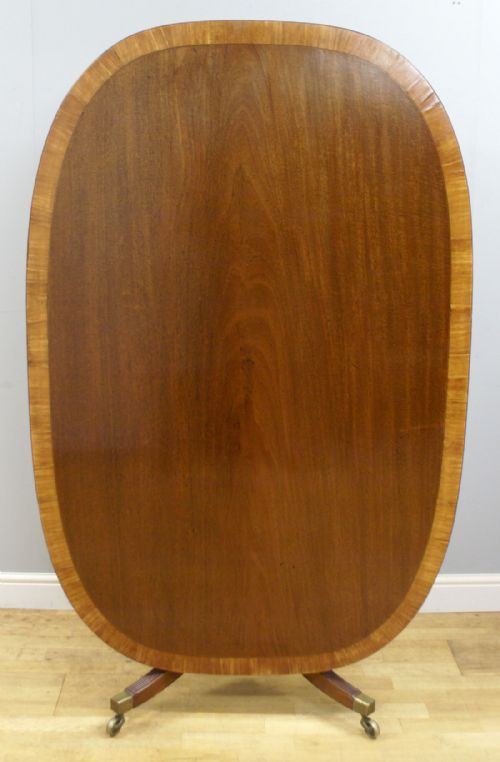 An Elliptical George III Mahogany Breakfast Table