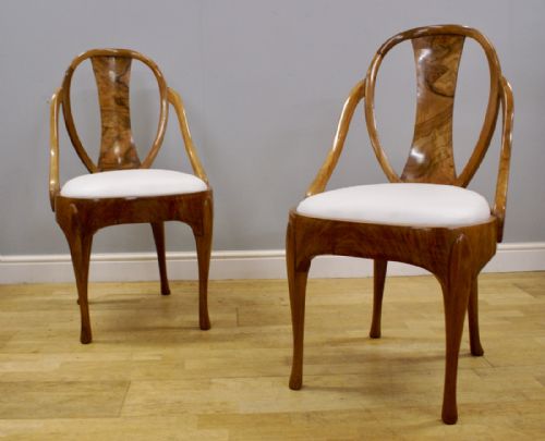 A Pair of Maurice Adams Arm Chairs