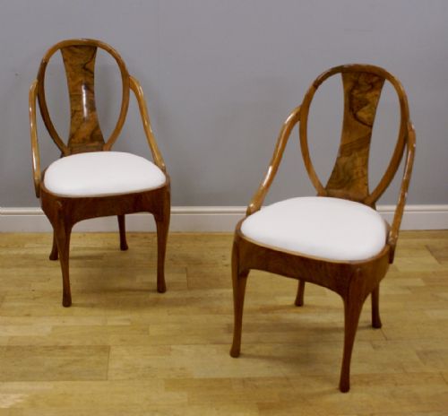 fig 1. A pair of Maurice Adams arm chairs