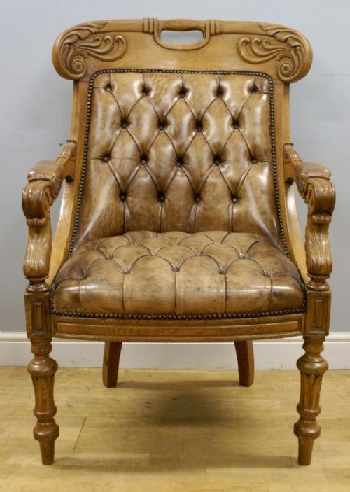 A Fine Carved Oak Library Arm Chair Attributed to Gillow.