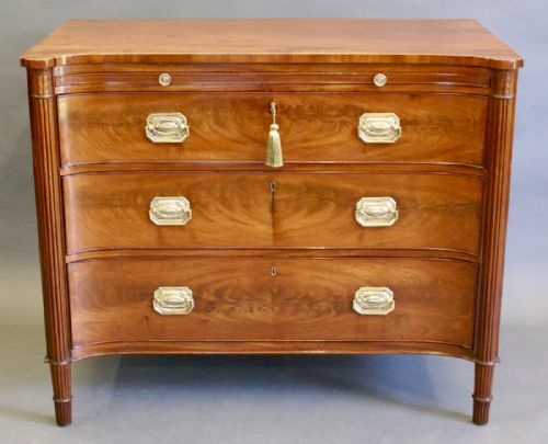 A George III Concave Fronted Commode/chest