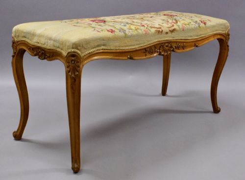 A Victorian Stool with Tapestry Upholstery
