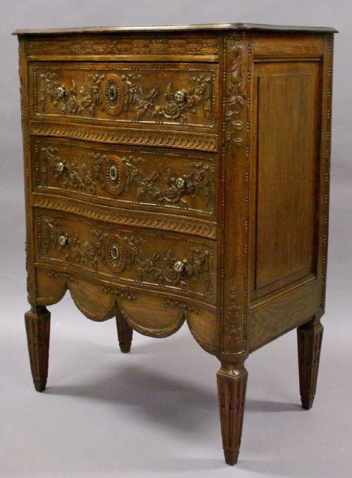 A Small French Oak Serpentine Commode/chest