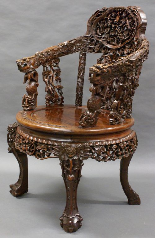 A Superb 19th Century Chinese, Hardwood Arm Chair