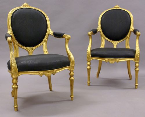 A Pair of 18th Century English Gilt Arm Chairs