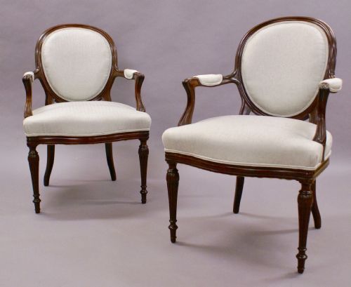 A Fine Pair of Hepplewhite Revival Arm Chairs