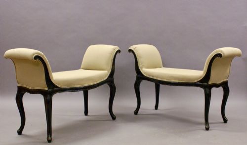 A Pair of Ebonised Window Seats