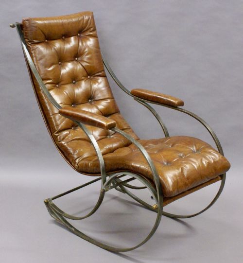 A Steel and Leather Rocking Chair by R.w.winfield.