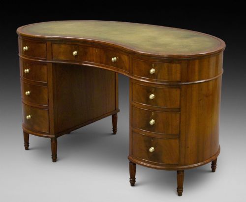 A Kidney Shaped Desk by Howard & Sons