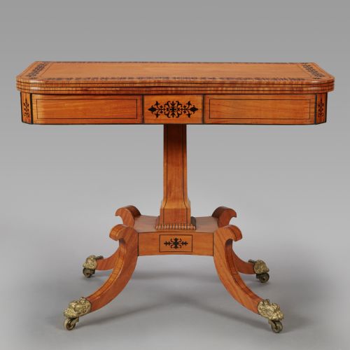 A 19th Century Late Regency Period Satinwood and Ebony Inlaid Pedestal Card Table.