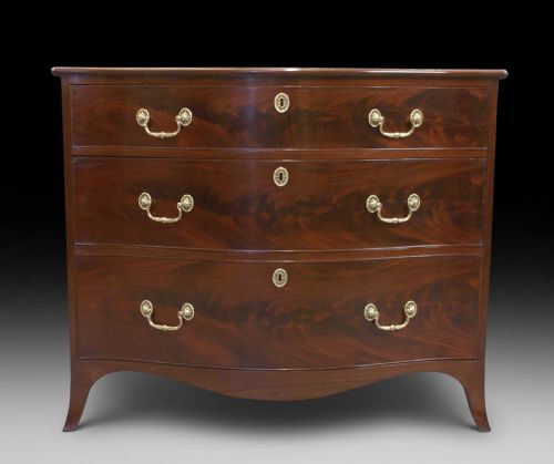 A George III Serpentine Chest