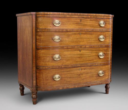 A Late Georgian "D" Front Chest of Drawers