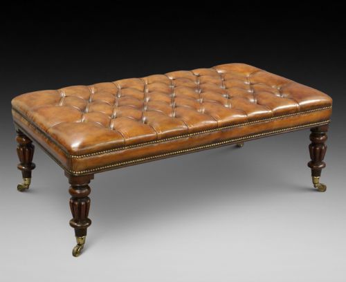 A Very Large Leather Upholstered Stool