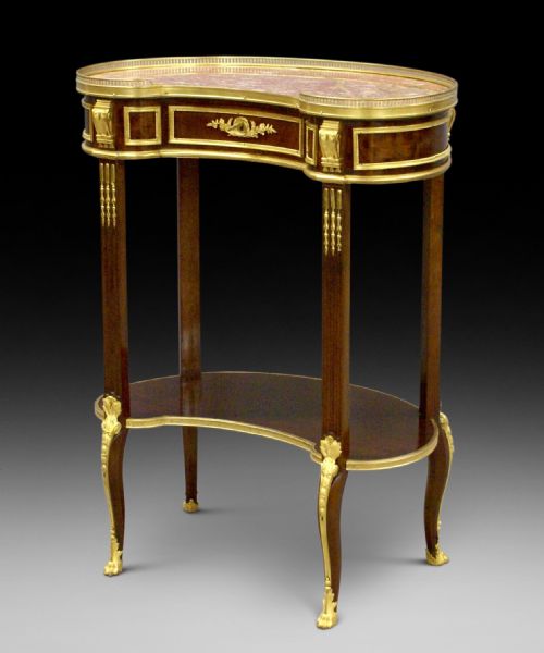 A Fine French Mahogany and Ormolu Mounted Table