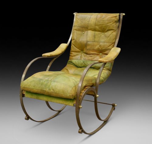 A Steel and Leather Rocking Chair by R.w.winfield.