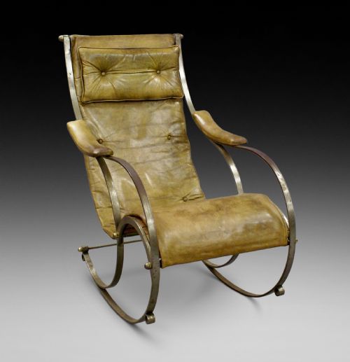 A Steel and Leather Rocking Chair by R.w.winfield.