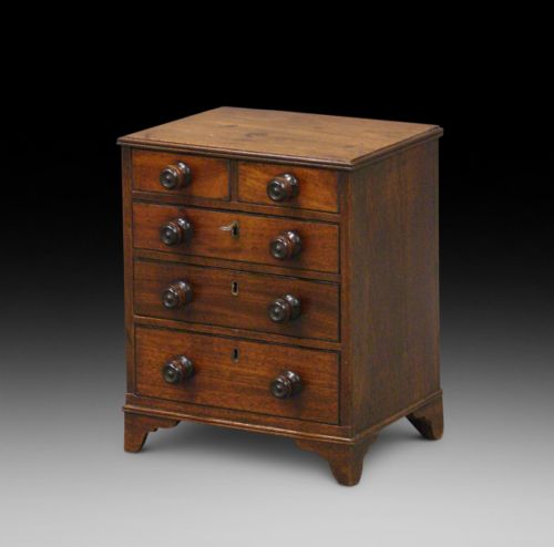 A Georgian Miniature Chest of Drawers