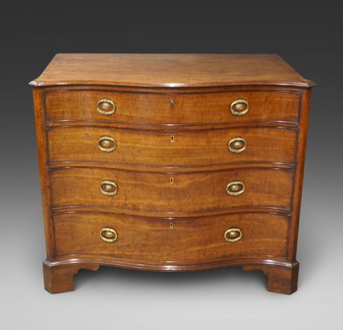 A George III Mahogany Serpentine Chest