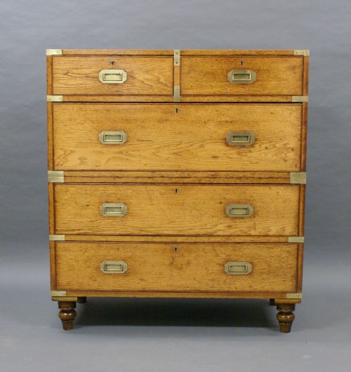 AN OAK MILITARY OR CAMPAIGN CHEST OF DRAWERS - ADDITIONAL PHOTO 1