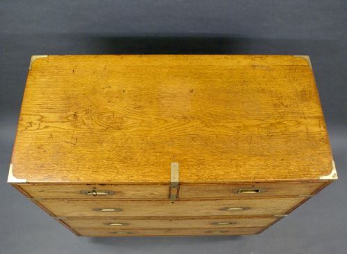 AN OAK MILITARY OR CAMPAIGN CHEST OF DRAWERS - ADDITIONAL PHOTO 3