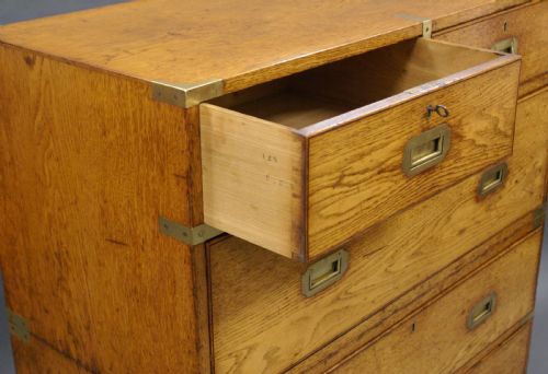 AN OAK MILITARY OR CAMPAIGN CHEST OF DRAWERS - ADDITIONAL PHOTO 4